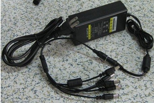 Yüksek kaliteli AC100V-240V L70 * W25 * H60 1A Adaptör cctv kamera güç kaynağı